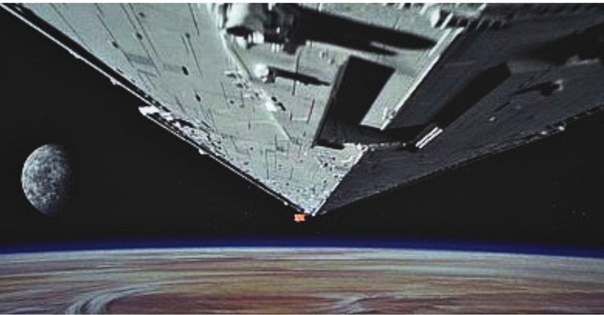 Destructeur impérial Star Wars survolant une planète dans l’espace avec lune en arrière-plan