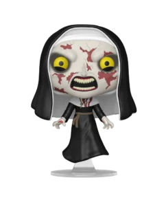 Funko Pop! Movies La Nonne n° 1710, visage marqué, yeux jaunes et robe noire en lévitation sur son support, sur fond transparent.
