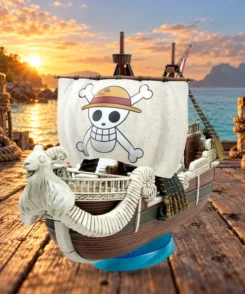 Maquette Going Merry Netflix assemblée sur son support, dans un décor illustratif de quai au lever du soleil.