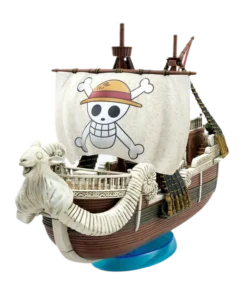 Going Merry Netflix Bandai assemblé, avec sa proue sculptée, sa grande voile et son support bleu.